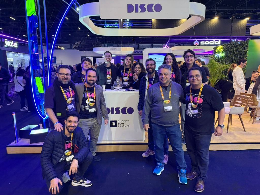 Time da Disco reunido no estande da Disco no Fórum E-commerce Brasil 2025